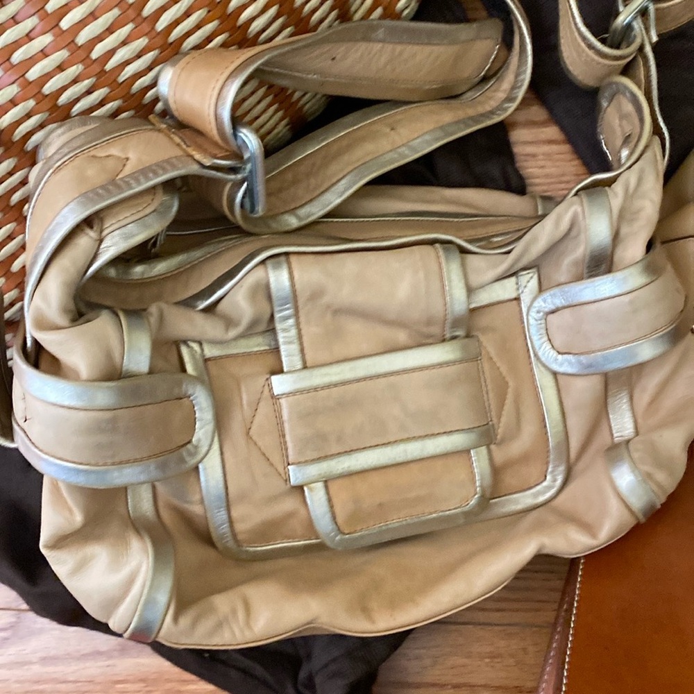 11 Designer bags in very loved condition.